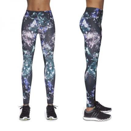 Custom sublimated gym leggings with a dark galaxy crystal print for bulk manufacturing and private label sportswear brands.