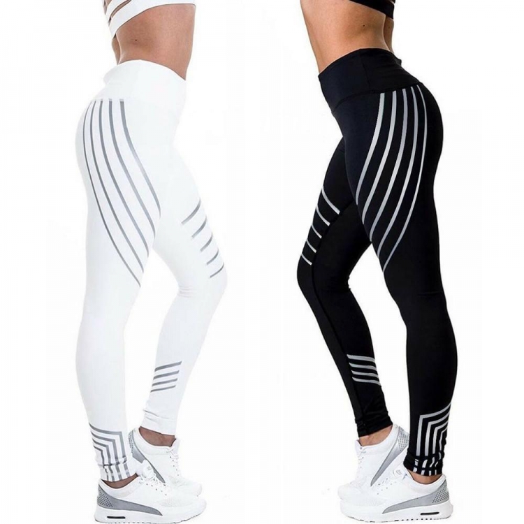 Striped Performance Leggings Bulk OEM Supply High-waisted black and white gym leggings with reflective silver stripe designs for private label fitness brands and bulk manufacturing.