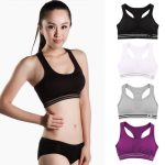 Multi-color racerback sports bra collection featuring seamless compression fabric for bulk OEM and private label sportswear manufacturing.