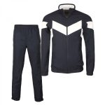 Professional navy blue tracksuit set with white chevron chest paneling, featuring a full-zip stand-collar jacket and matching elasticated trousers for B2B bulk manufacturing.