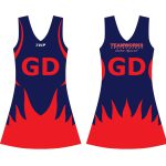 Women's navy blue netball dress with red flame pattern on the hem and GD positional lettering for bulk B2B manufacturing.