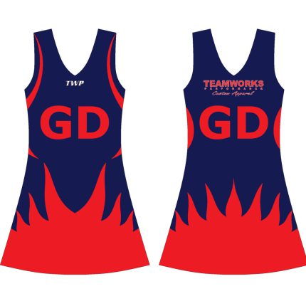 Women's navy blue netball dress with red flame pattern on the hem and GD positional lettering for bulk B2B manufacturing.