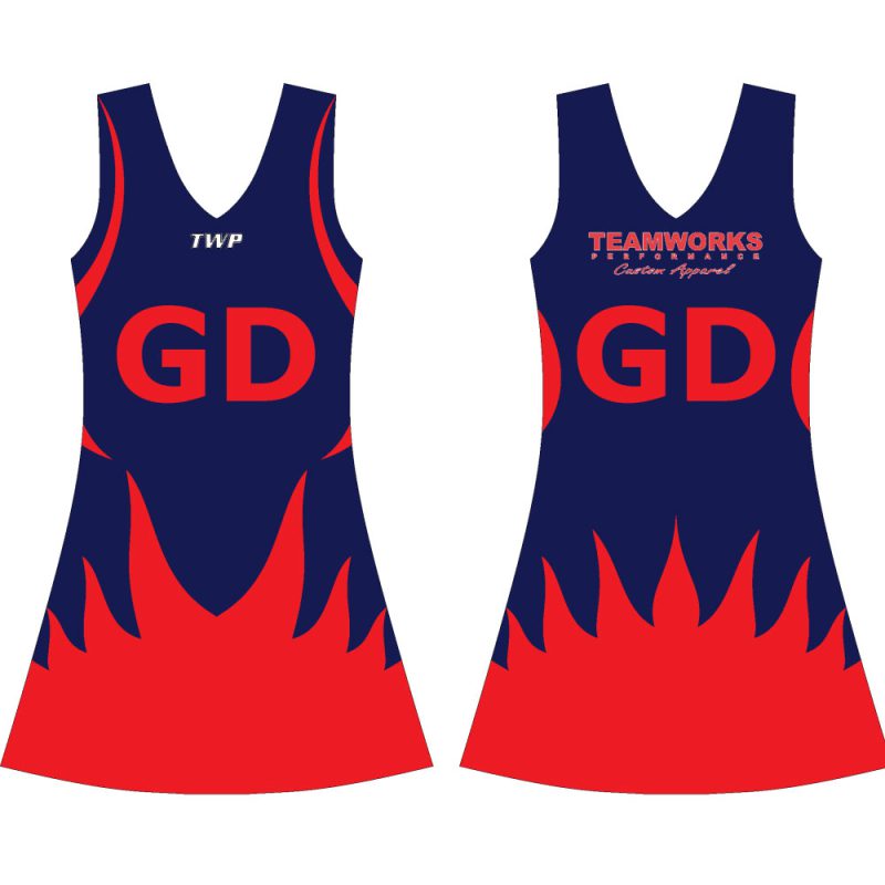 Women's navy blue netball dress with red flame pattern on the hem and GD positional lettering for bulk B2B manufacturing.