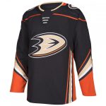 Professional black ice hockey jersey with orange and tan accents and a duck-foot logo for bulk B2B manufacturing.
