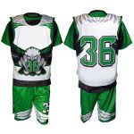 Custom green and white sublimated lacrosse uniform kit featuring eagle mascot graphics and player numbering, produced for private label brands and wholesale distributors.
