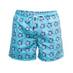Men's light blue swim shorts with all-over white and navy turtle pattern for bulk B2B manufacturing.